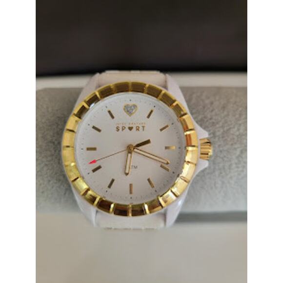 Juicy Couture Sport Women\'s Watch with Gold Tone Jeweled Bezel Animal Print Band